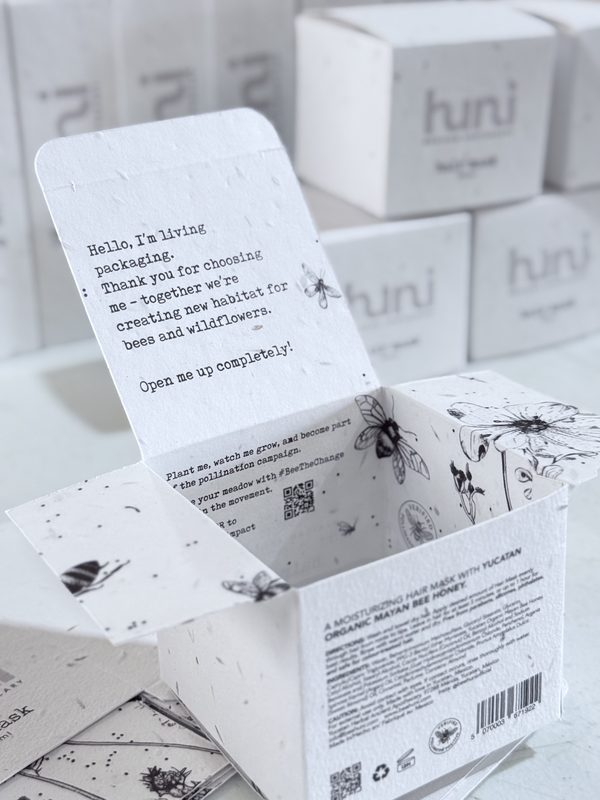 huni living packaging — seed paper box with bee illustrations
