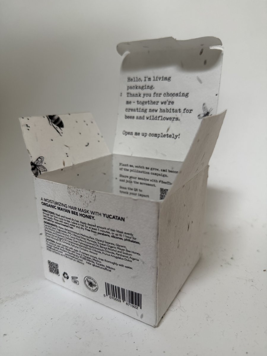 huni living packaging — seed paper box with wildflower seeds and bee illustrations