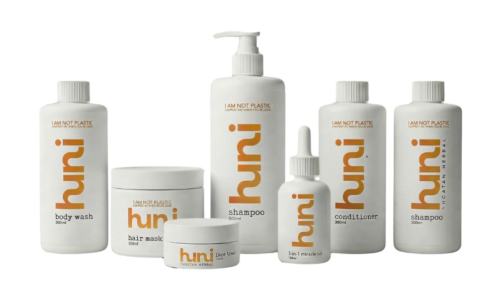 huni product range: body wash, hair mask, shampoo, face treatment, conditioner, 3-in-1 miracle oil